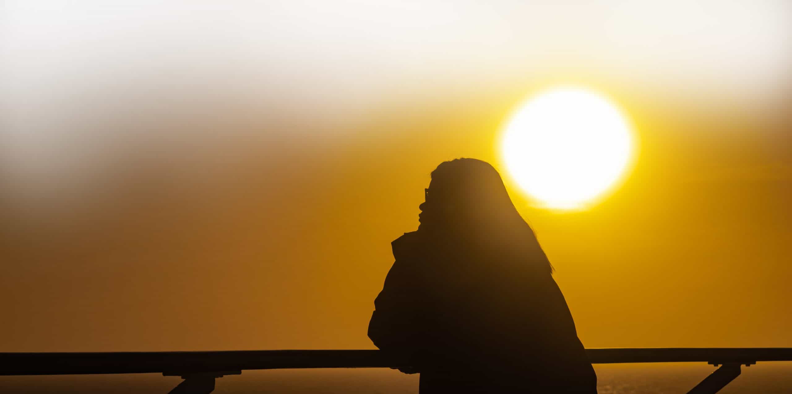 watching the sunset at sea