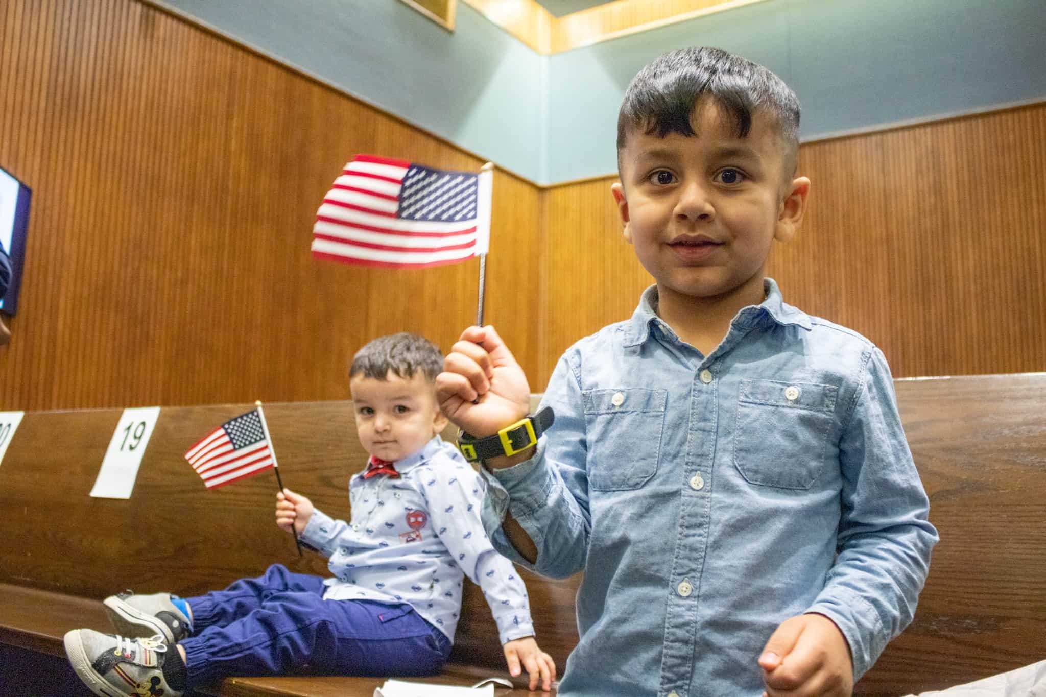 Kids waving flags