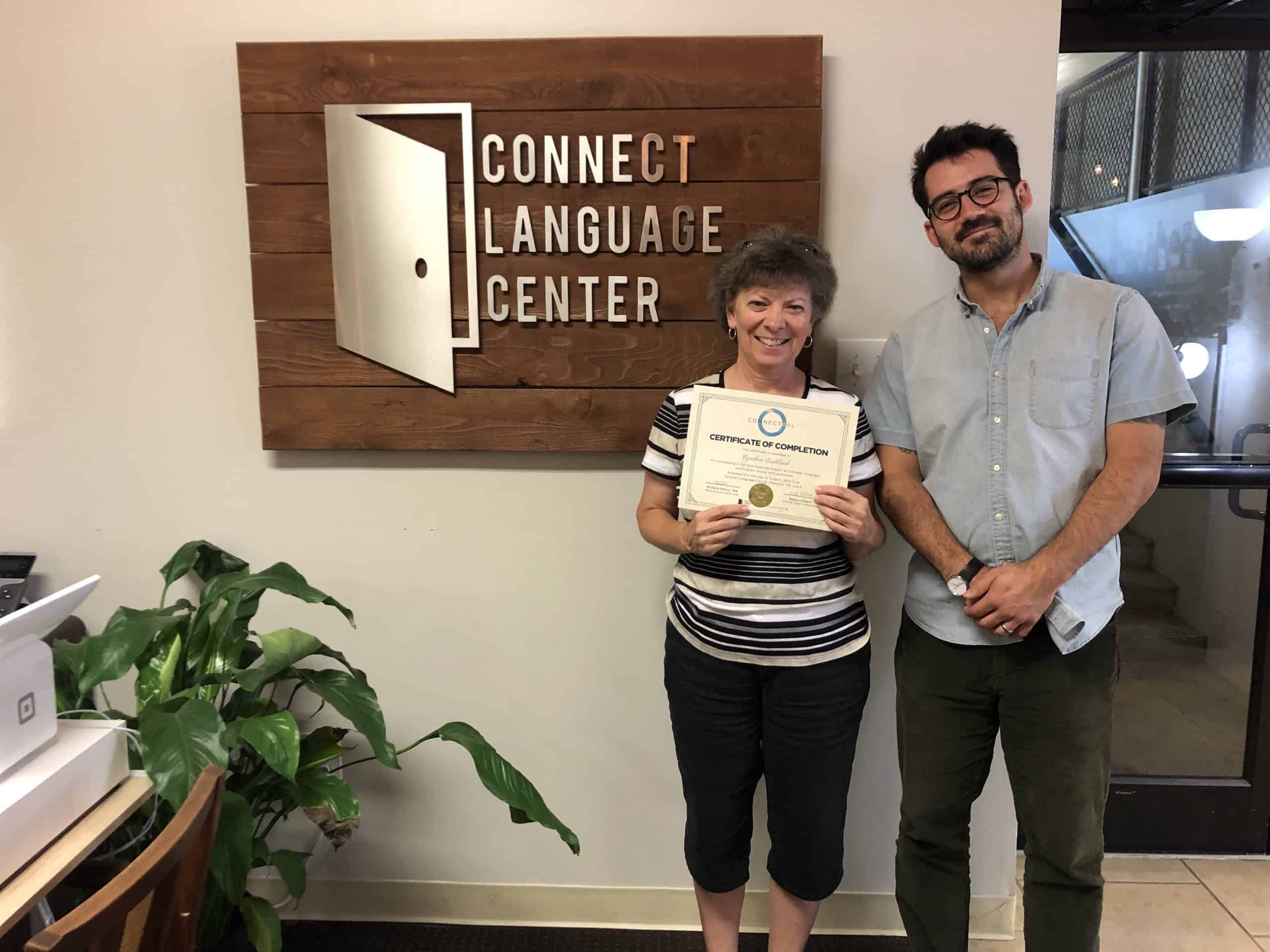 Student receives ConnecTEFL certificate.