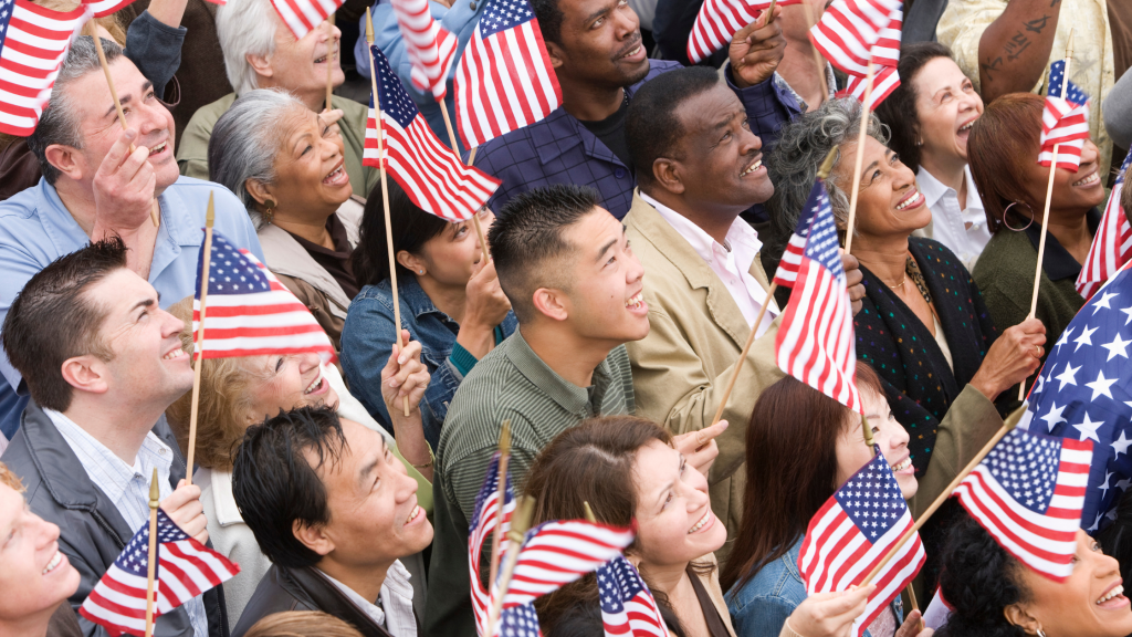 new citizen celebrate after swearin the Oath of Allegiance