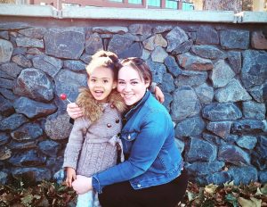 Image of Angela and her daughter.