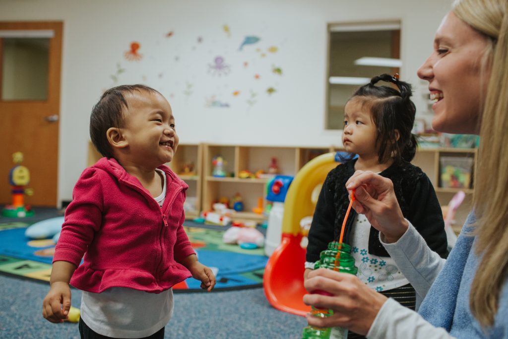 Refugee children enjoy fun activities as part of the resettlement process. 