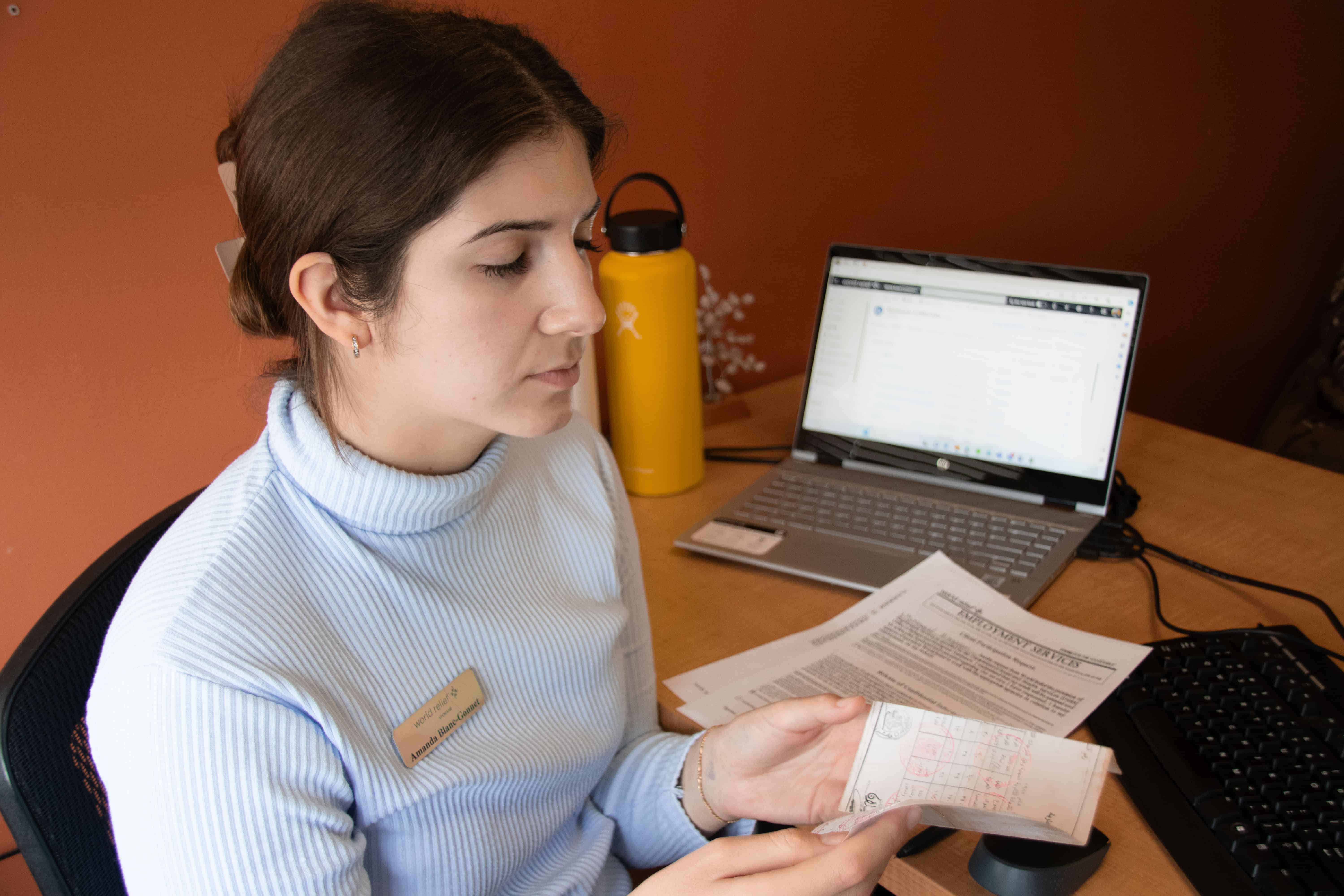A Case manager checking documents.