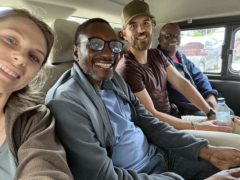 Amanda takes a selfie with three World Relief staff in a car during a Humanitarian Disaster Response Unit leadership retreat.