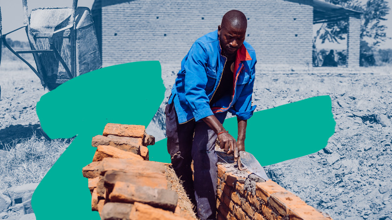 World Relief 2024 Annual Report: A man lays bricks in Malawi.