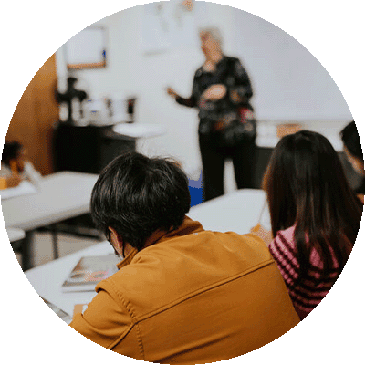 gift-guide-gh-adult-ed-esl-class Classroom of people learning English