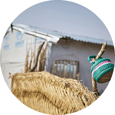 gift-guide-ip-displacement emergency shelter and a fence