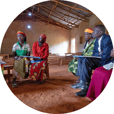 gift-guide-ip-family-strengthening-parents-support-network two pairs of parents sitting in a class