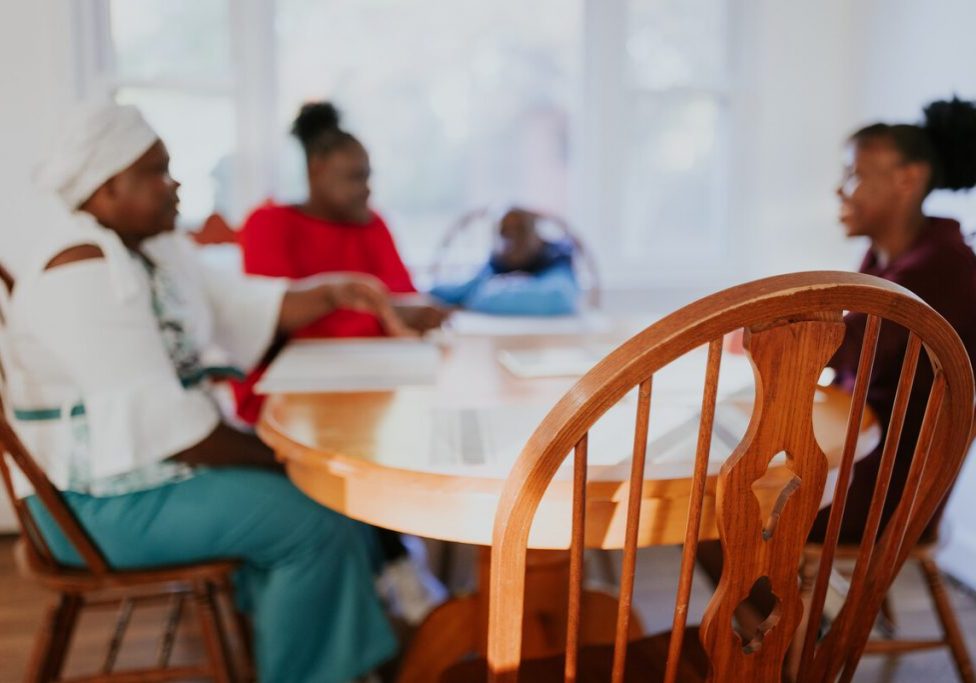 North Carolina resettled refugee family at dinner table