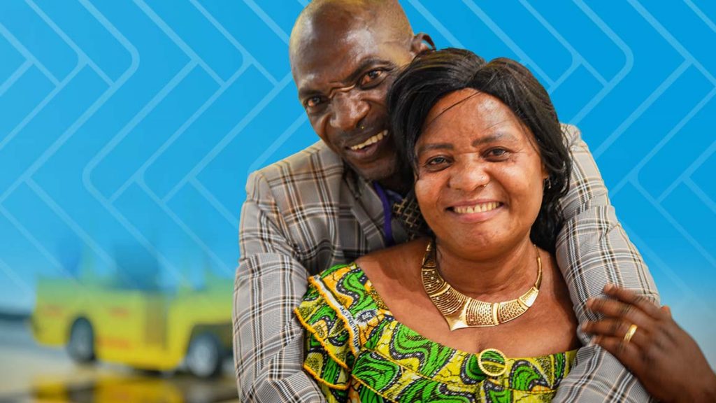 Newlywed refugees, Goreth and Mbimbi, embrace after being separated for seven years.