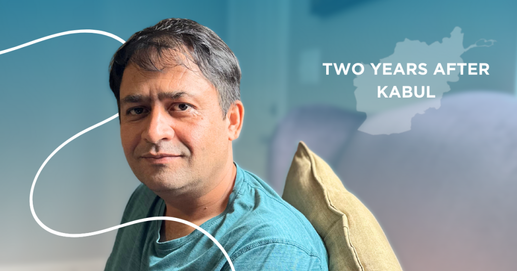 Afghan man siting in chair