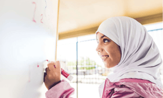 Syrian-girl-learning-2.jpg - IV