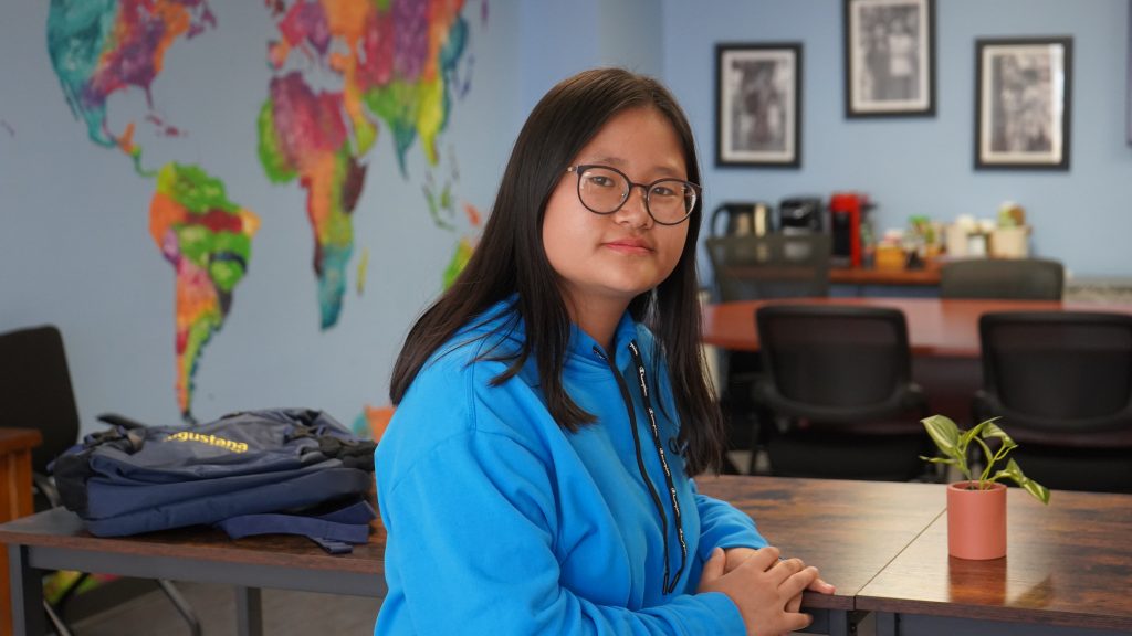 An image of a Youth Mentoring student sitting at a table