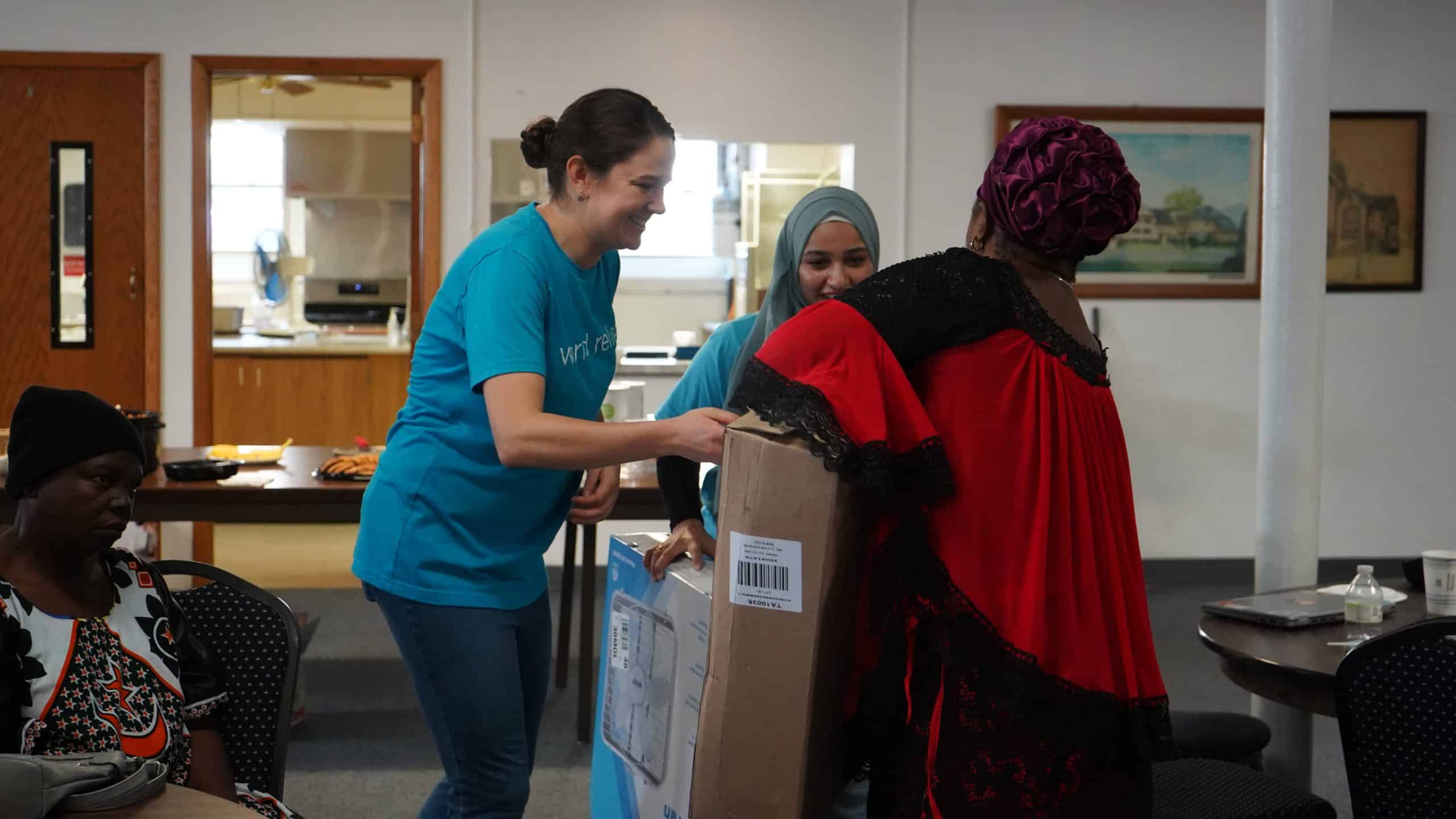 three people interacting