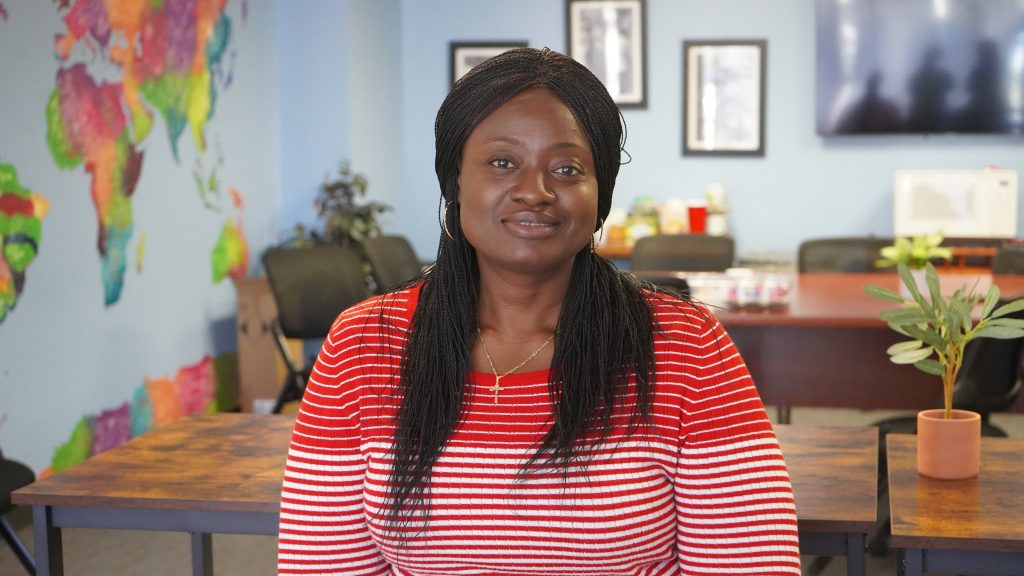 a woman in an office lobby