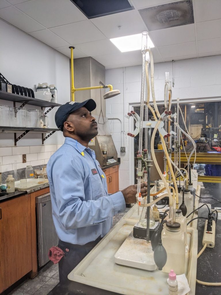 Prapa uses knowledge from his Master of Science in Biotechnology in the laboratory.