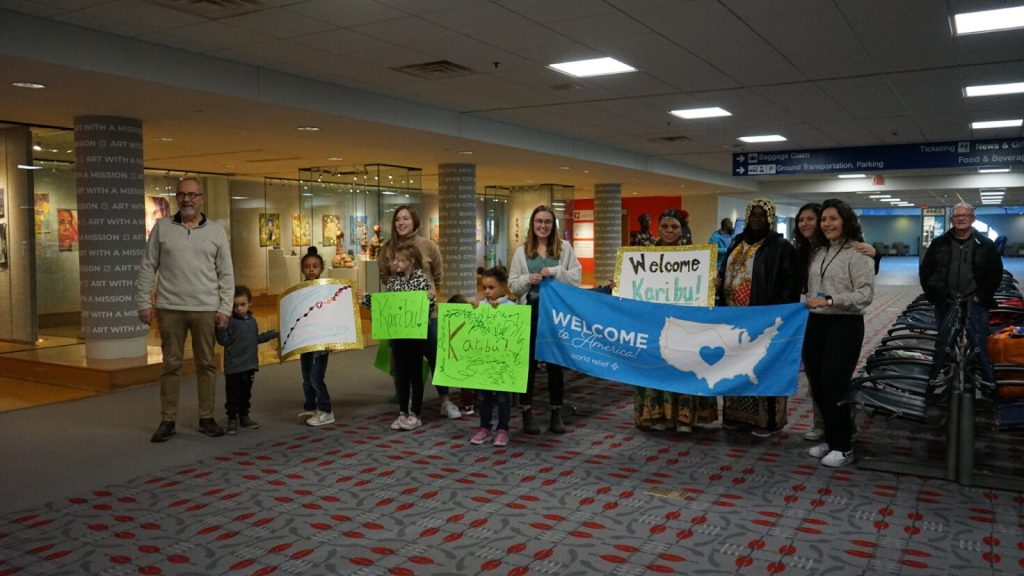 Quad Cities staff welcoming new arrivals.