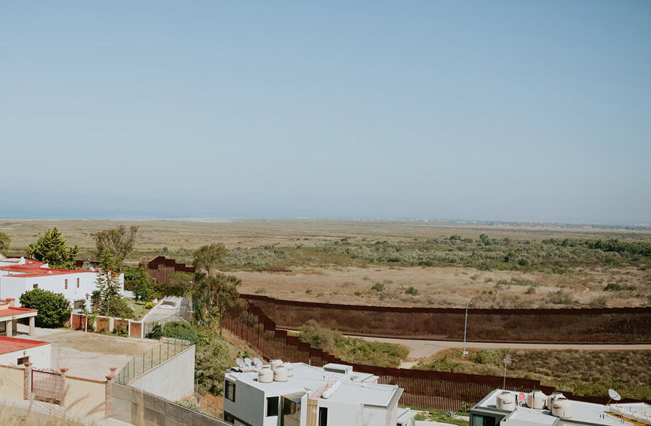 Current humanitarian crisis: A view of the U.S.-Mexico border wall and crossing. Photo Credit: Emily Frazier for World Relief