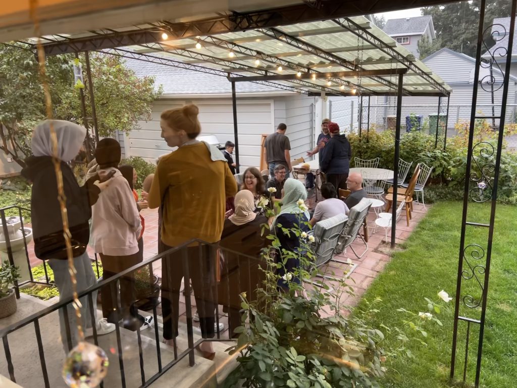 Immanuel church in spokane hosting a garden party with refugees from the Middle East.