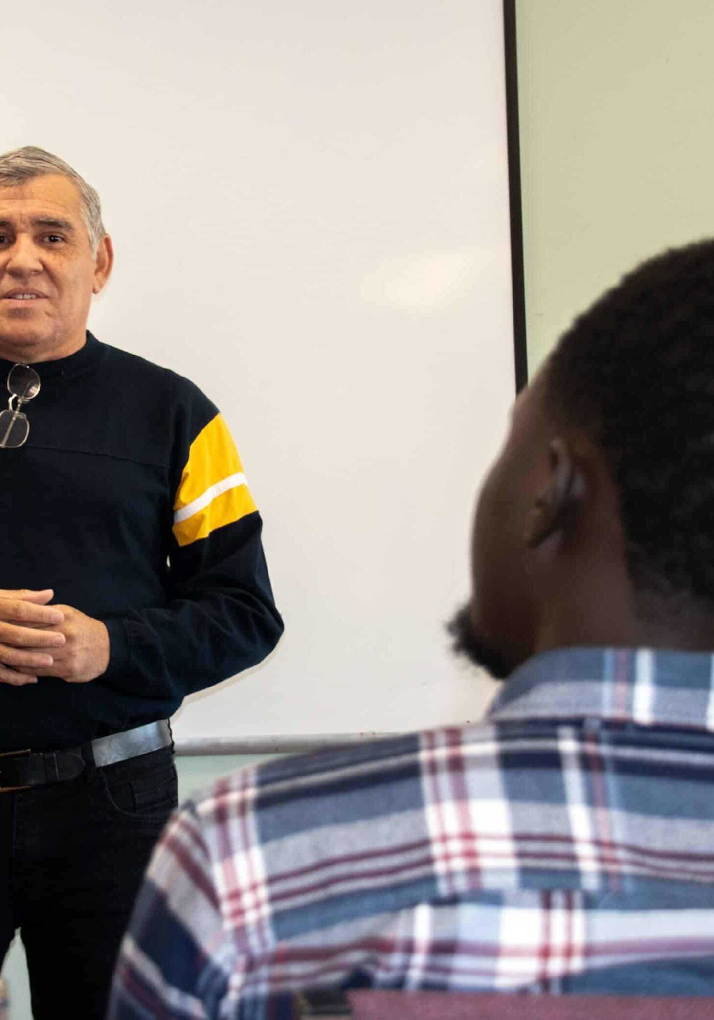 Financial literacy student gives a speech at his graduation.